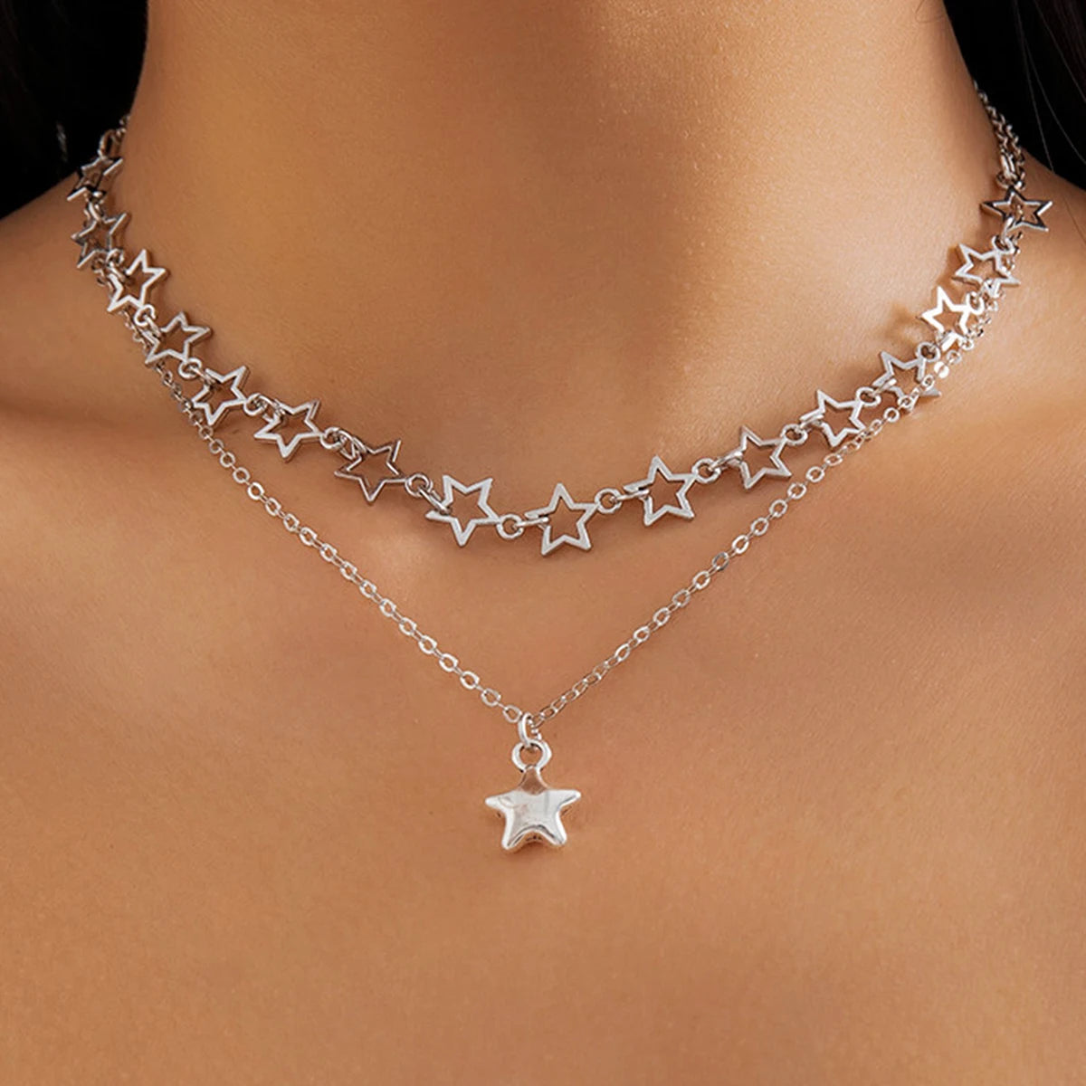 silver starlight necklace, on neck, front view