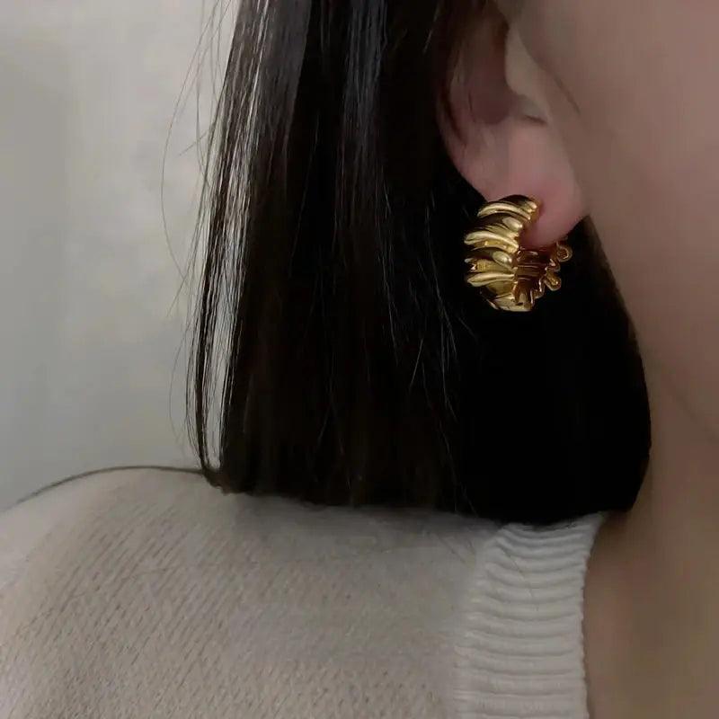 Gold ZigZag Molten Earrings | On Ear